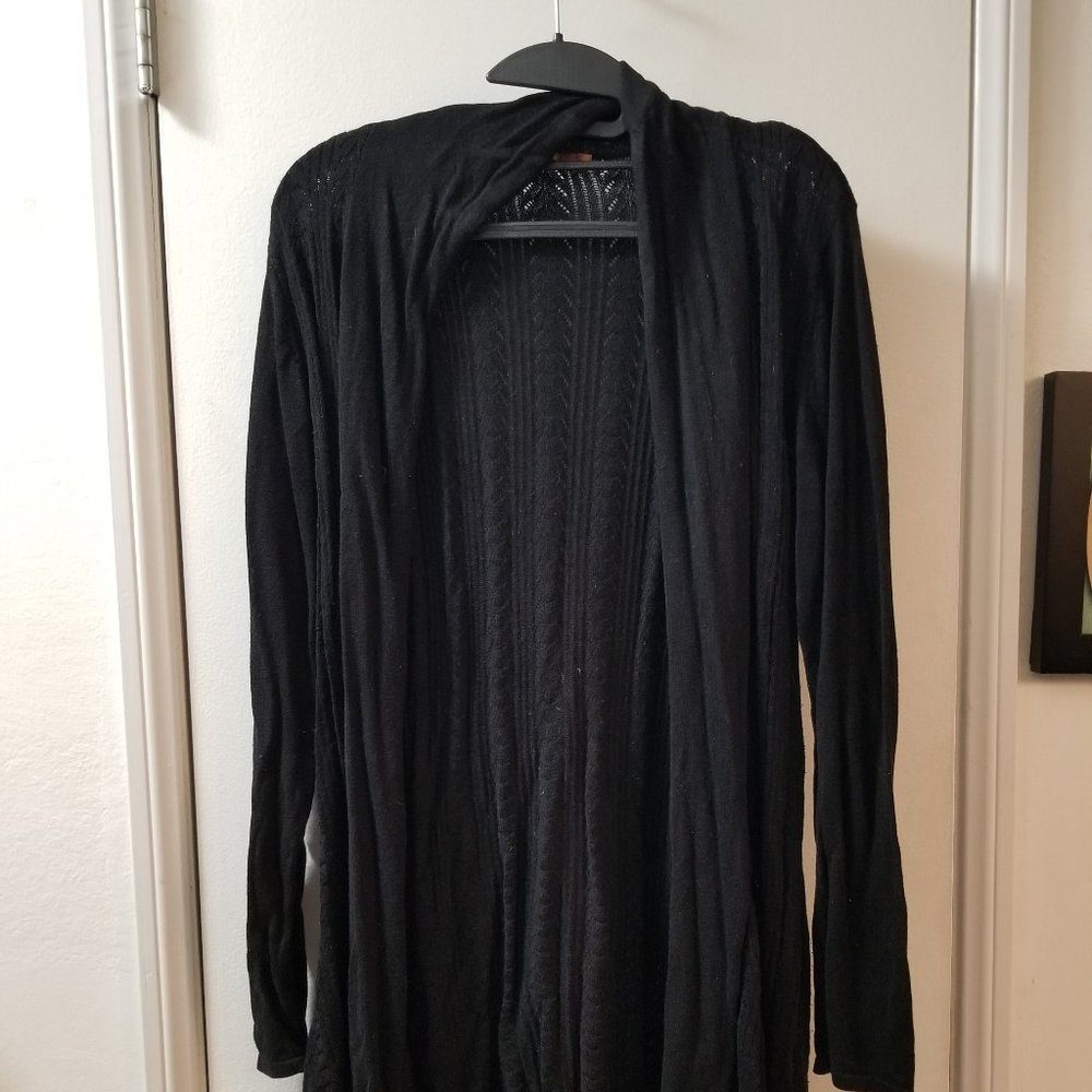 long sleeve knitted flyaway sweater, jhas a litle whole